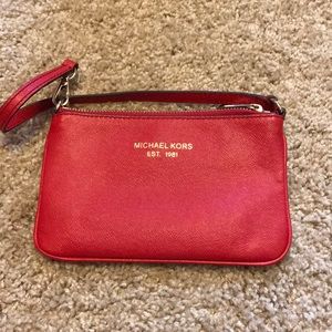 Great condition! Wristlet!